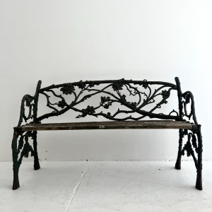 A 19th century cast iron, leaf and branch bench 