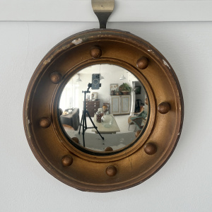 A miniture late 19th century regency convex mirror 