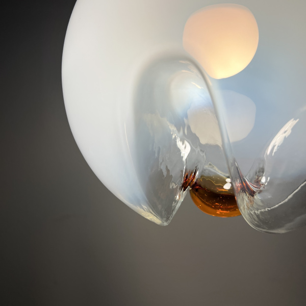 A Mezzega chandelier in a cascading trio of opaline to amber glass from the 1970s image